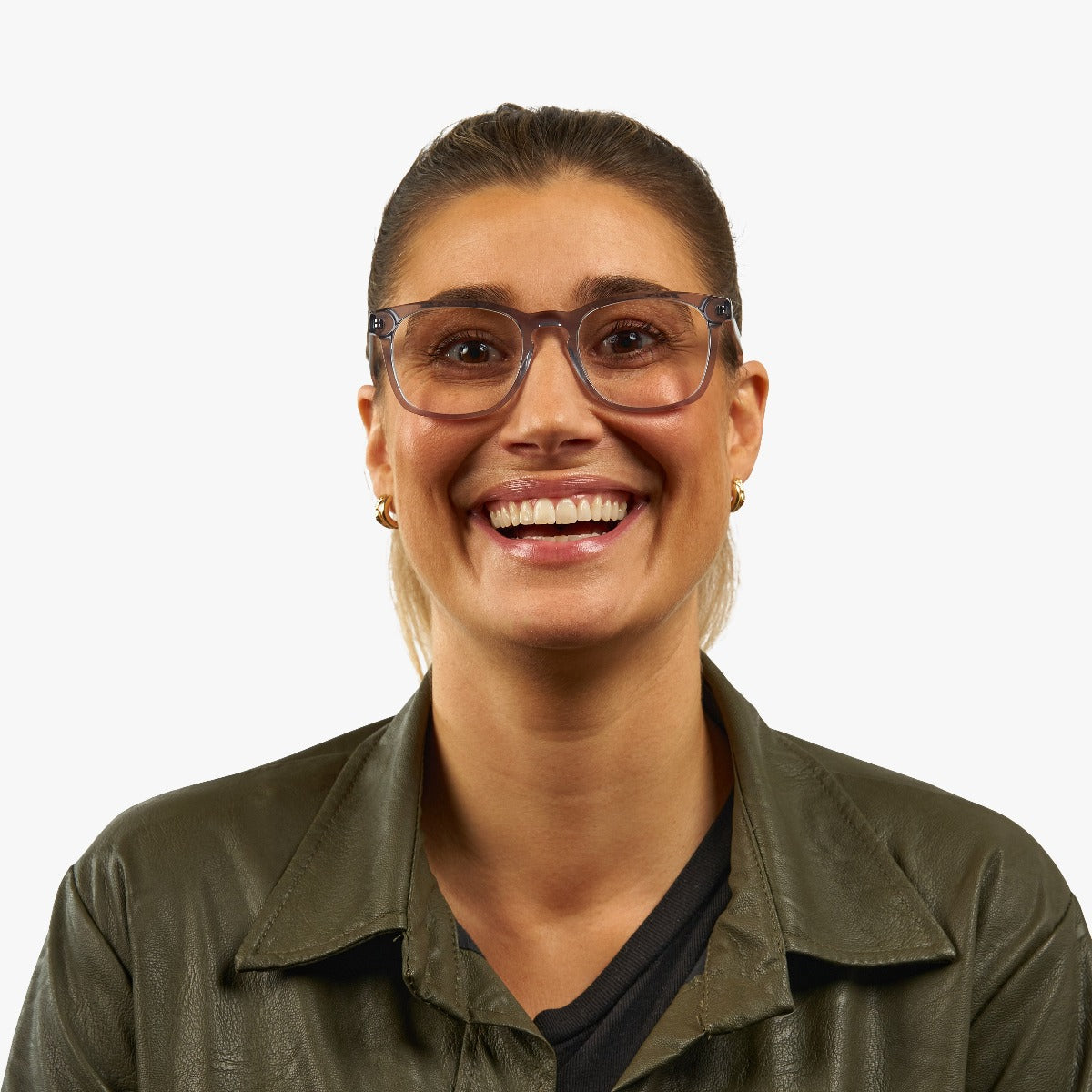 Person wearing Bornholm Crystal Grey reading glasses