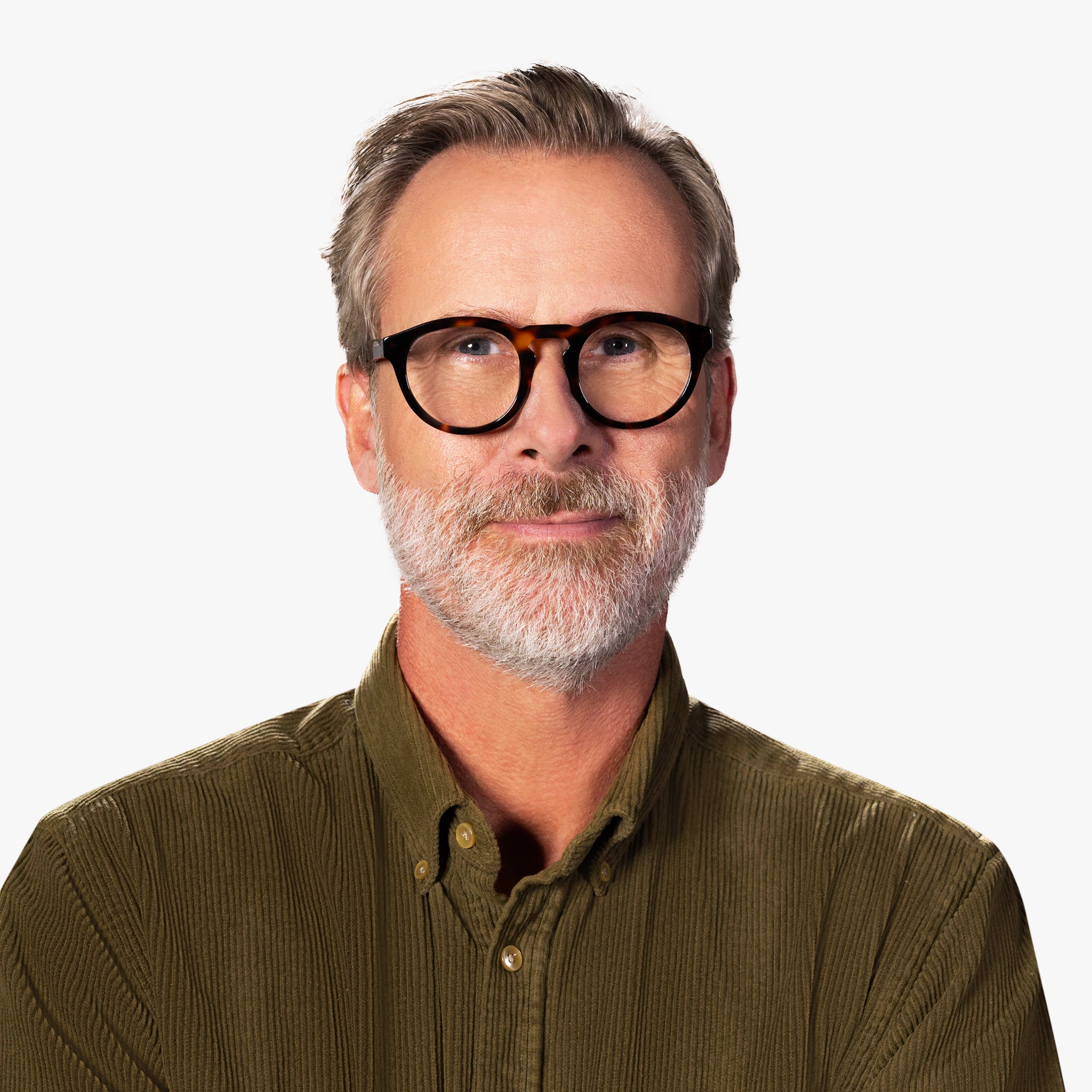 Person wearing tortoise-shell reading glasses