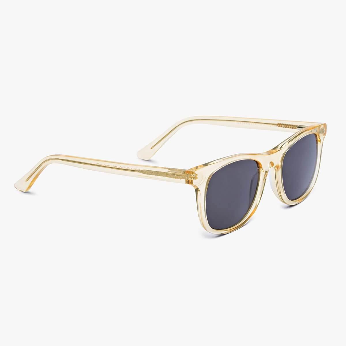 Crystal lemon sunglasses with dark lenses and transparent frames