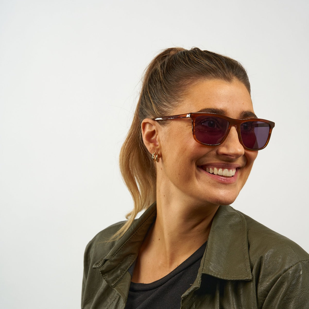 Person wearing Oslo Shiny Walnut sunglasses