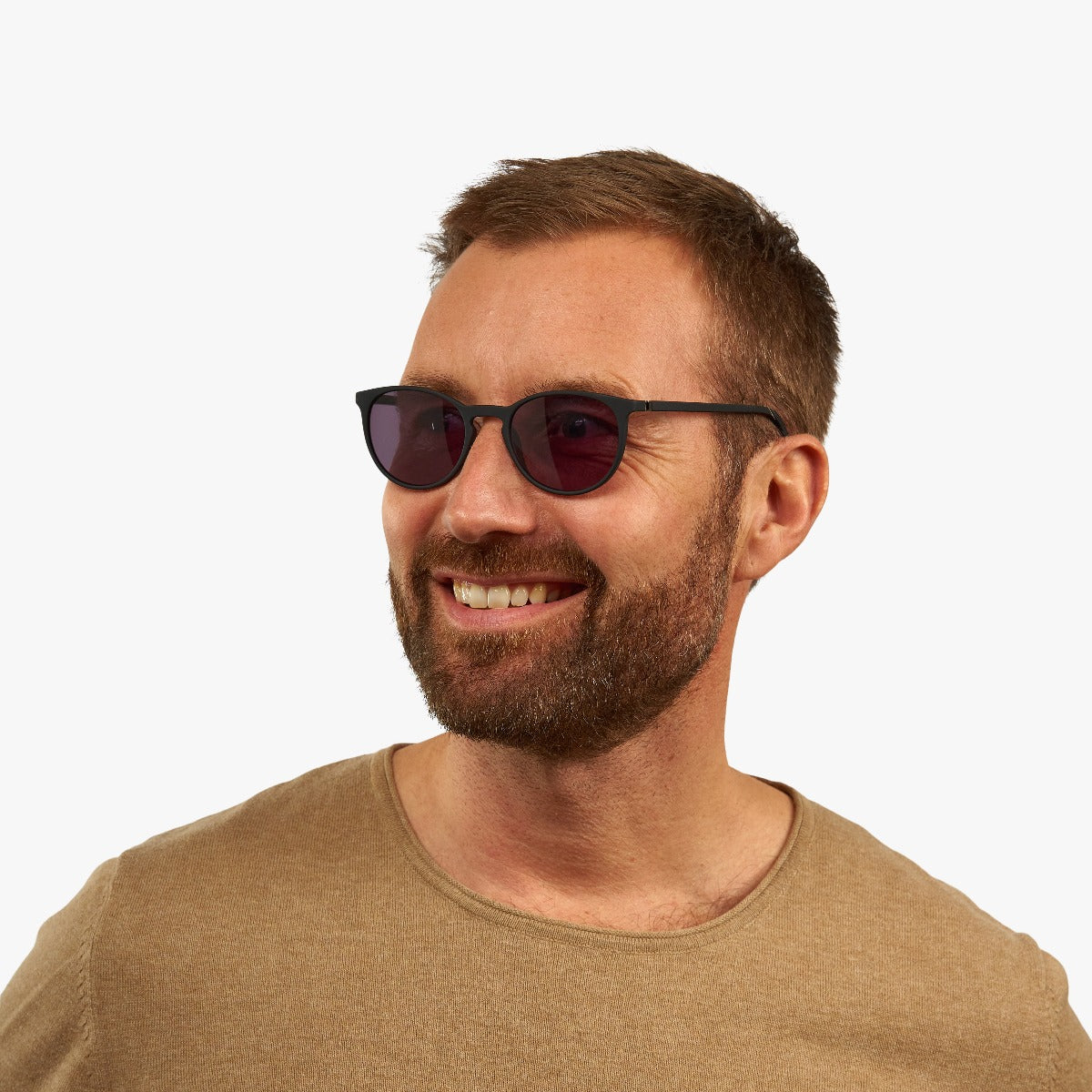 Person wearing Stockholm Black sunglasses