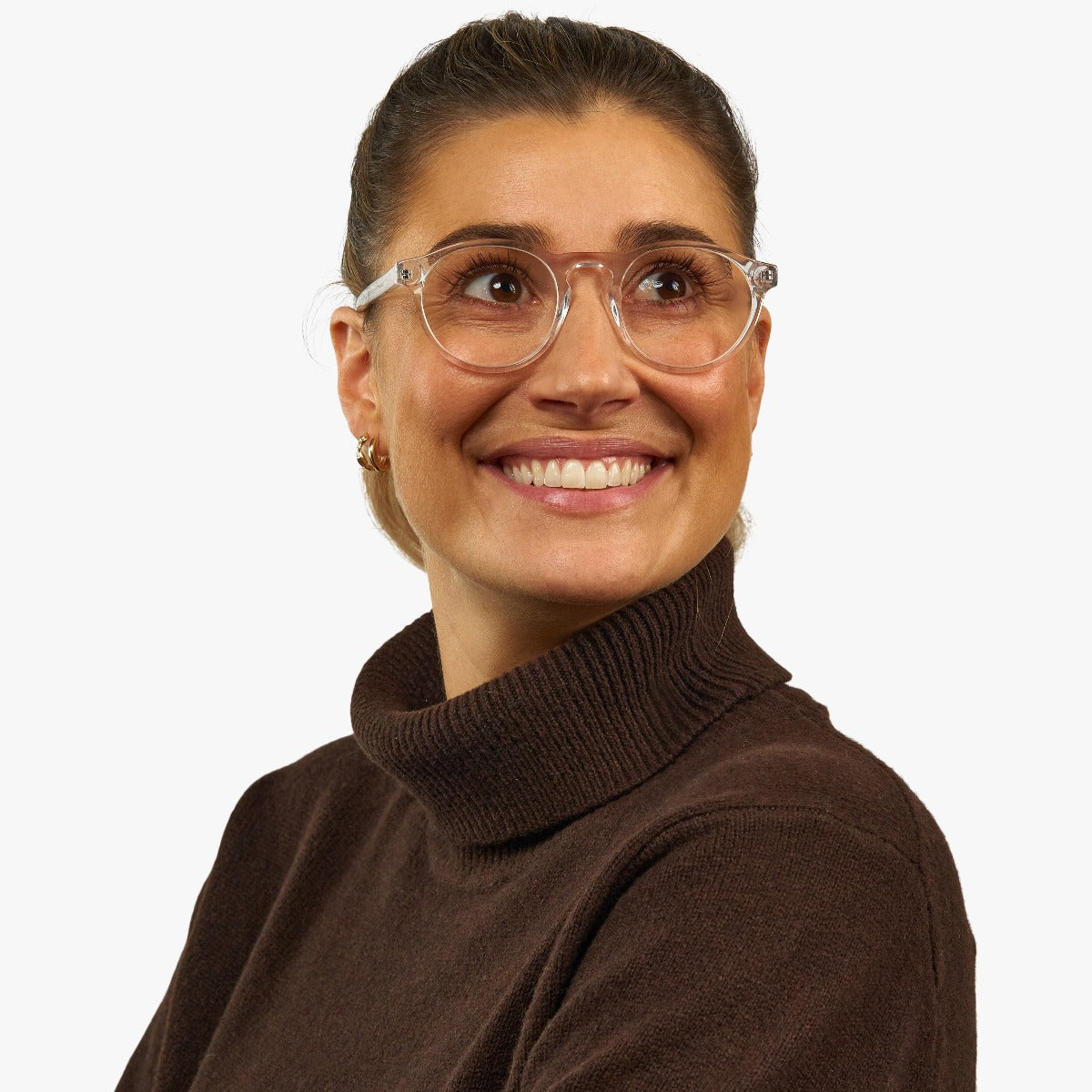 Person wearing Trondheim Crystal White reading glasses