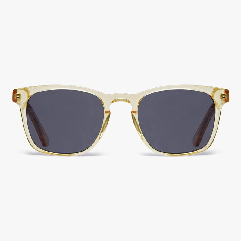 Square crystal lemon sunglasses with translucent yellow frames and dark lenses