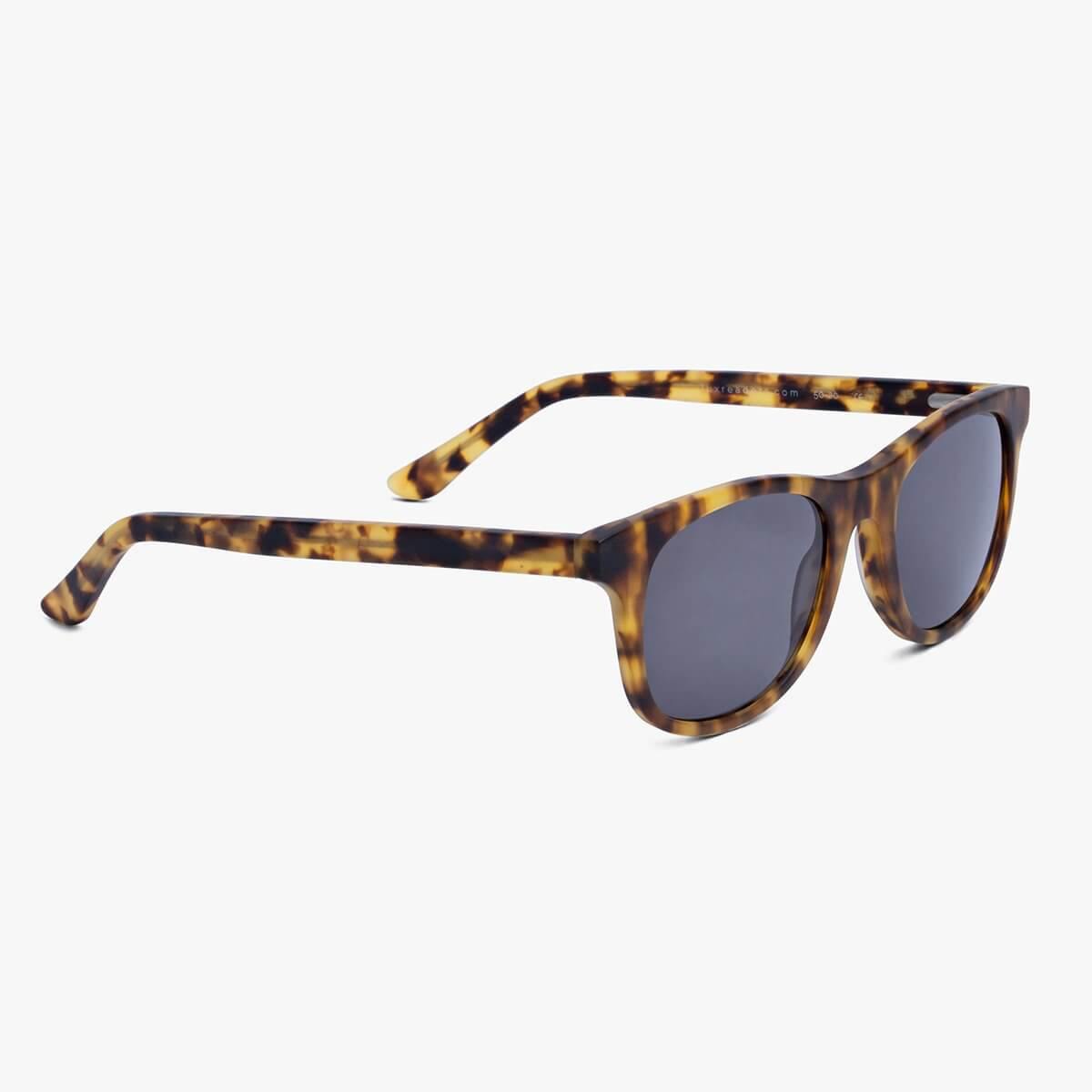 Tortoise shell sunglasses with dark lenses