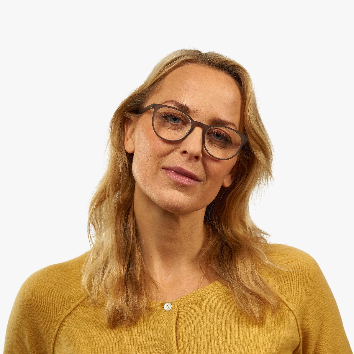 Person wearing Women's Stockholm Grey reading glasses